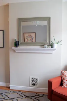 یک نقطه کانونی اتاق نشیمن را با یک قفسه دیواری مصنوعی بدون نیاز به DIY ایجاد کنید