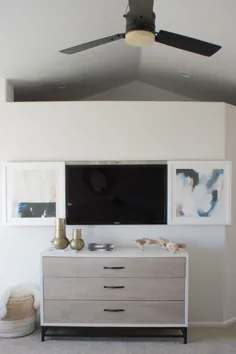 DIY: هنری قاب شده که برای پنهان کردن تلویزیون شما اسلاید می کند