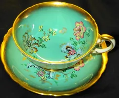 PARAGON ART DECO BUTTERFLY GOLD WIDE TEA CUP و SAQCER TURQUOISE