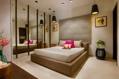 عناصر Fuchsia در اتاق خواب اصلی بژ با دیوار آینه و چراغ های آویز توسط Dhaval Patel