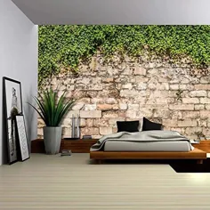 تاک های سبز که از کاغذ دیواری با دیوار آجری قدیمی جدا می شوند