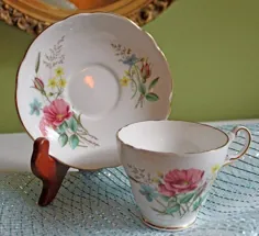 فنجان چای و نعلبکی با گل - چای استخوان چین تنظیم شده توسط Regence ، انگلیس