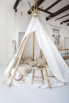چادرهای Wigwam ایده های اتاق بازی کودکان را با تزئین اتاق خواب دنج اتاق کودکان ترکیب می کند