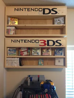 برخی از قفسه ها را برای بازی های DS و 3DS من ساخته اید ، همچنین آرم ها برای فضای ذخیره سازی بالا می روند.  (/ r / gamecollecting)