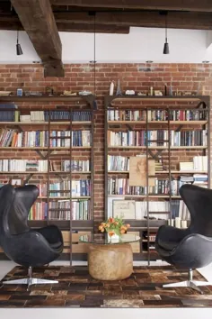 کتابخانه خانگی-با-دیوار-آجر-و-دکوراسیون-مدرن-راحت - Kismet Interiors