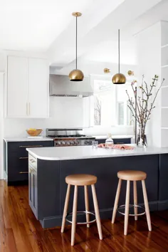 به گفته طراحان داخلی ، 7 بهترین رنگ رنگ کابینت برای یک آشپزخانه شادتر