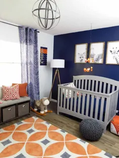 اتاق نوزاد نیروی دریایی ، خاکستری و نارنجی آشکار می شود