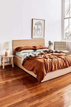 یک ظاهر طراحی اتاق خواب بوهمی: پارچه های سفالی ، سرامیک و هنر