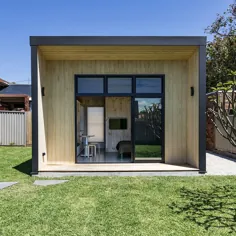 Yardstix "معماری حیاط خلوت" مدرن و فشرده را ارائه می دهد که از چوب چند لایه ساخته شده است