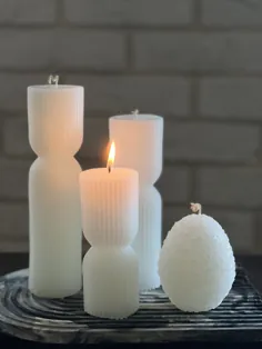 شمع سه‌تایی ایستا به همراه شمع تخم مرغی گل، مناسب برای دکوراسیون مخصوصا برای روی میز و کنسول خصوصا روبه روی آینه