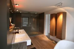 کابینت های دیواری ساخته شده از چوب اکسل حمامهای شاد gmbh مدرن |  احترام گذاشتن
