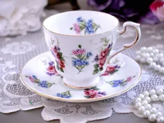 دسته گلهای گل رز فنجان چای پاراگون و کلبه صورتی نعلبکی |  اتسی