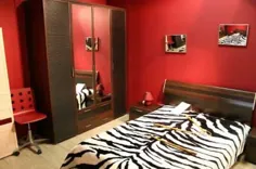 دیوارهای قرمز و سبک اتاق خواب پوست گورخر ، ایده های تزیین اتاق خواب
