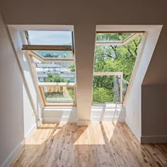 پنجره های سقف فاکرو باعث ایجاد نور و فضا به آپارتمان های اتاق زیر شیروانی در ویرجینیا می شوند