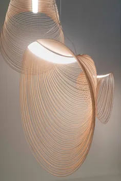 یک ترکیب چوب LED و برش لیزری برای ایجاد این چراغ آویز مجسمه سازی