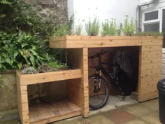 فروشگاه دوچرخه و ورود به سیستم با سقف سبز سقف های آلی باغ مدرن |  احترام گذاشتن