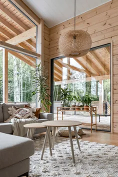 خانه ای مدرن نوردیک با فضای داخلی گسترده و پالت رنگ طبیعی