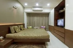 اتاق خواب با کمد تلویزیون و کفپوش مرمر توسط Milind Kapadia