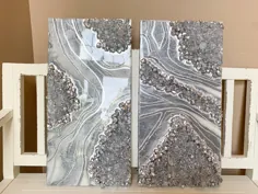 مجموعه اصلی Diptych از آثار هنری رزین ژئود نقره ای و سفید 2 12 12x24 ، هنر رزین ژئود ، هنر سه بعدی دیواری ، هنر ژئود نقره ای و سفید ، سخت افزار آویز سنگ مرمر