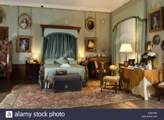 عکس - اتاق خواب ملیله در دادگاه Coughton ، Warwickshire.  تخت نیمه تستر ویکتوریایی است