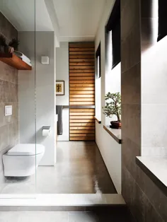 لهجه های چوبی این حمام را که با بتن پر شده است ، گرم کنید