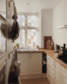 زندگی در فضای کوچک: یک آپارتمان دلپذیر دانمارکی با زنگ های آرام و خاکی