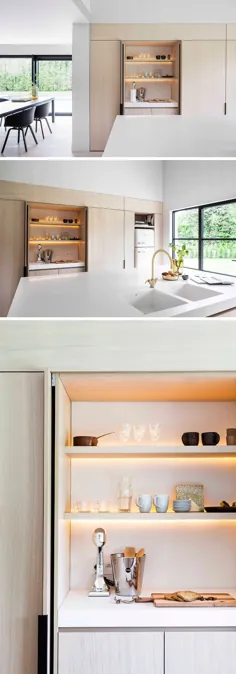 میزهای آشپزخانه چوبی و سفید نرمی خنثی را در این آشپزخانه ایجاد می کنند