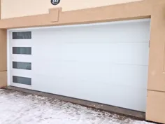 درب گاراژ سفید مدرن با جدار برقی نصب شده در میدلند