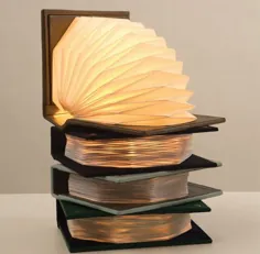 چراغ کتاب با چراغی مانند آکاردئون پیانو - Designbuzz همراه است