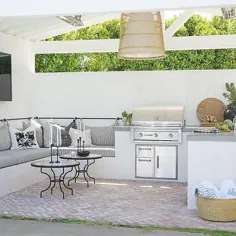 آشپزخانه فضای باز آجر سفید با ایده های طراحی میز بتونی