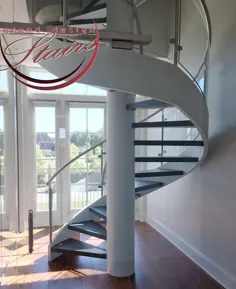 راه پله مارپیچی شیشه ای در لوئیزیانا - دفتر جدید - راه پله مارپیچی مهندسی عالی با نرده شیشه ای خمیده ، بدون ثابت کننده های قابل مشاهده  |  احترام گذاشتن
