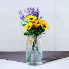 گلدان شیشه ای گلدار رنگارنگ با گل آفتابگردان برای دکوراسیون منزل