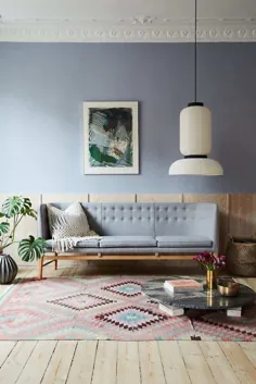 داخلی اسکاندیناوی با سطوح خام و دیوارهای آبی روشن