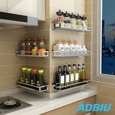 دیوار قفسه ادویه ای آشپزخانه یک لایه لایه نقره ای سازماندهی می شود