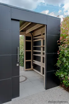 طراحی خانه باغ ساخته شده برای اندازه گیری در مونیخ - "جعبه سیاه" |  احترام گذاشتن