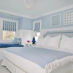 اتاق خواب کلبه آبی با هنر Shadowbox بالای تخت - کلبه - اتاق خواب