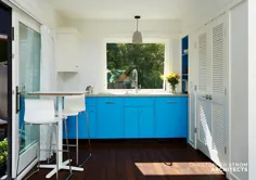 آشپزخانه خانه کوچک: میزهای بتونی و رنگ آبی پررنگ |  مینیاپولیس ، مینه سوتا