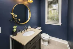حمام آبی سرمه ای با آینه طلایی