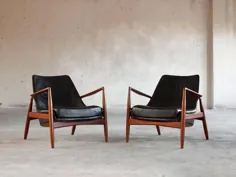 Ib Kofod-Larsen مجموعه ای از دو صندلی صندلی "Seal" با چرم سیاه
