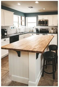 کابینت های سفید میز چوبی آشپزخانه