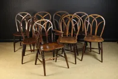 قیمت فروخته شده: مجموعه ای از هشت صندلی خاکستر ، نارون و Fruitwood Windsor قرن نوزدهم.  هفت صندلی کناری و یک صندلی راحتی.  حلقه های کم پشت قاب های چوبی خمیده خمیده را از مرکز عبور می دهد تا یک قوس گوتیک ایجاد کند.  صندلی های نارون روی پاهای چرخانده شده با فرم H تبدیل شده متحد می شوند - تاریخ نامعتبر به GMT