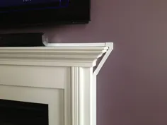 نصب تلویزیون دیواری با پنهانکاری سیم بر روی شومینه