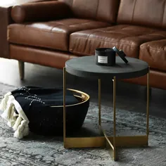 میز لهجه میز کناری سیاه و سفید از جنس طلا ساخته شده است