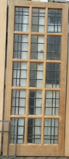 درب چند تخته دوست داشتنی بلوط ، که در حال حاضر در نمایشگاه عتیقه های Regency موجود است.  Regency Antiques در درب های ویکتوریایی اصلاح شده و درب های ادواردی احیا شده ، درهای عتیقه ویکتوریا و ادواردین ، ​​پنجره های شیشه های رنگی و مبلمان دوره ای بازسازی می شود