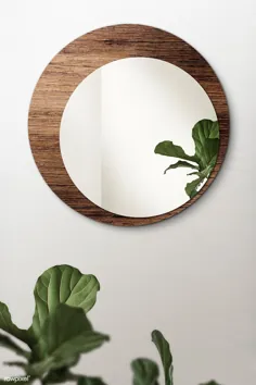 تصویر برتر آینه دایره ای با پس زمینه چوبی را بارگیری کنید