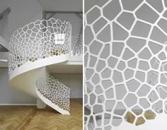 یک راه پله مارپیچ سفید هنری ، ظرافت مدرن را به این آپارتمان در پاریس می بخشد