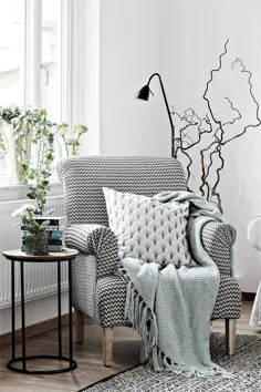 Deux appartements، un fauteuil noir et blanc - PLANETE DECO دنیای خانه ها
