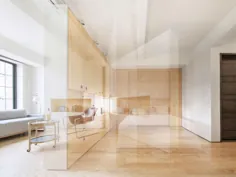 آپارتمان 400 فوت مربع از دیوار محوری هوشمند برای تقسیم فضا به روشهای مختلف استفاده می کند
